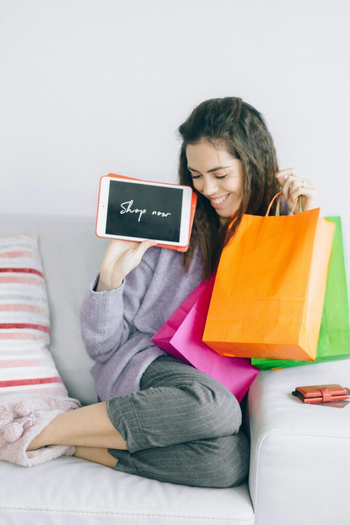 Young lady shopping e-commrce feanor ventures llc helping e-commerce brand scale their marketing